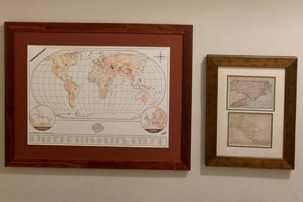 Framed vintage world maps wall display