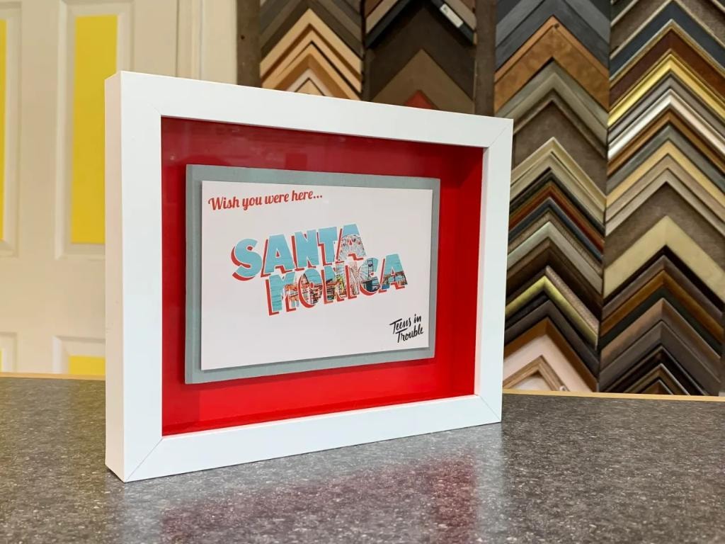 Framed Santa Monica vintage postcard display